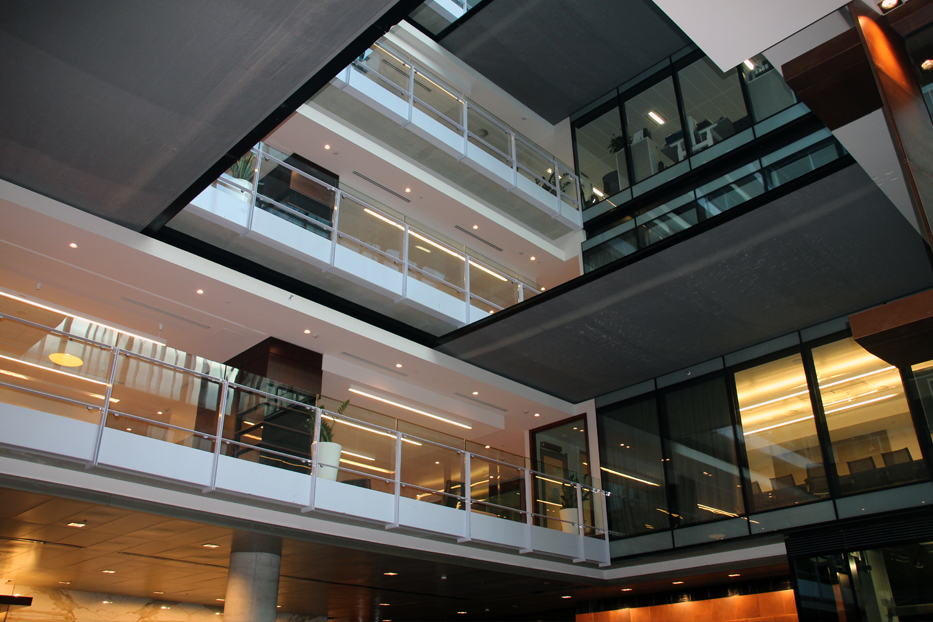Coopers Fire FireMaster NVS Horizontal fire curtain protecting an atrium from fire in an office