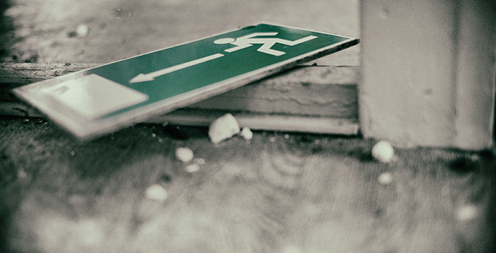Fire exit sign on floor
