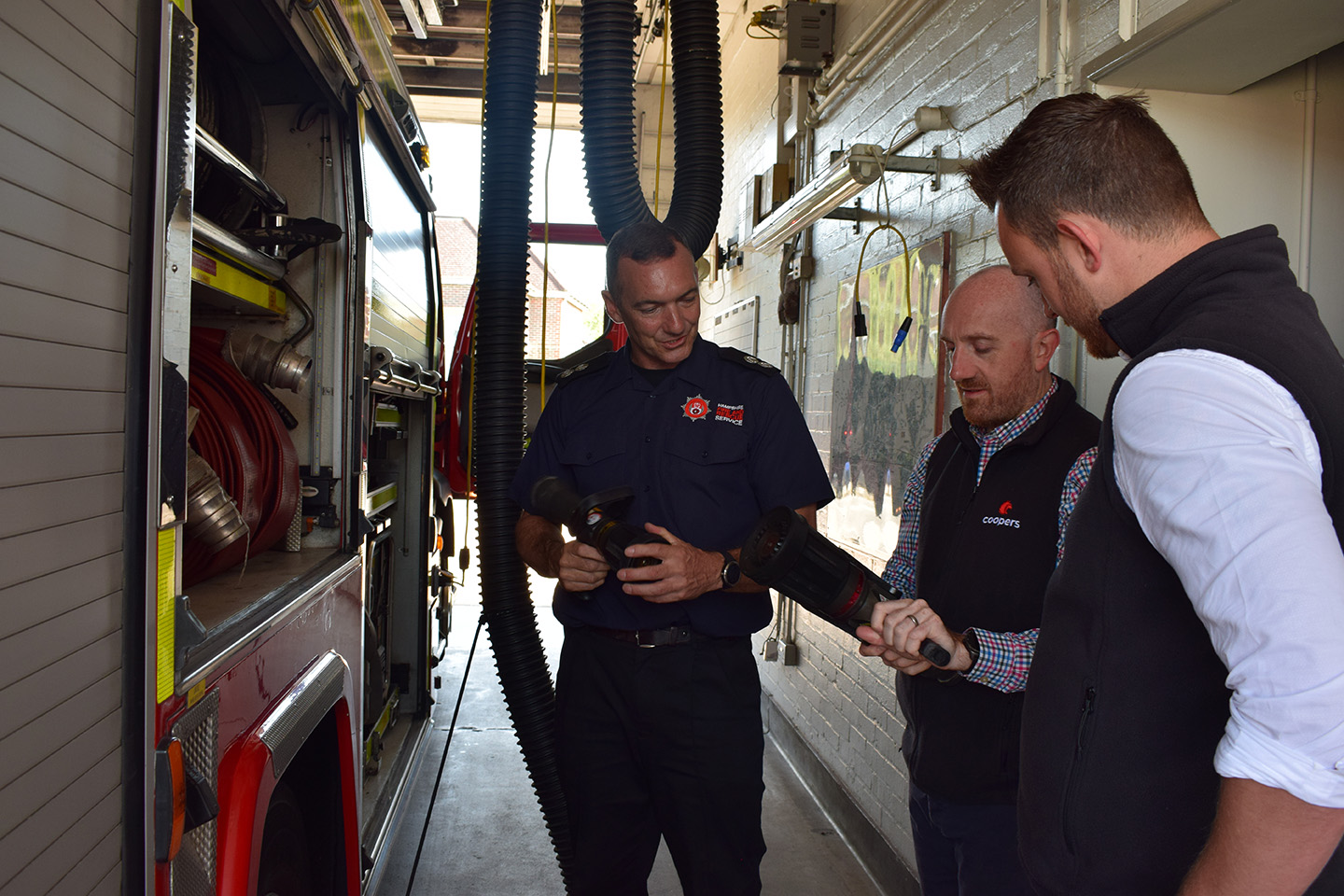 Coopers Fire Sat Havant fire station looking at different fire fighting equipment