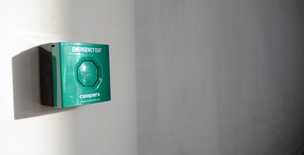 Green emergency exit button at Coopers Fire HQ