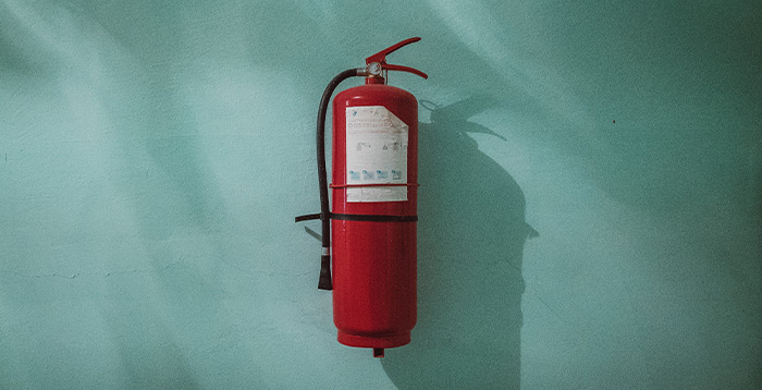 Fire extinguisher on wall