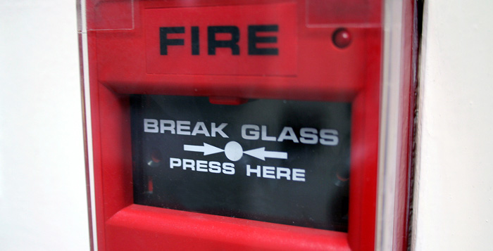 Break glass in case of fire button