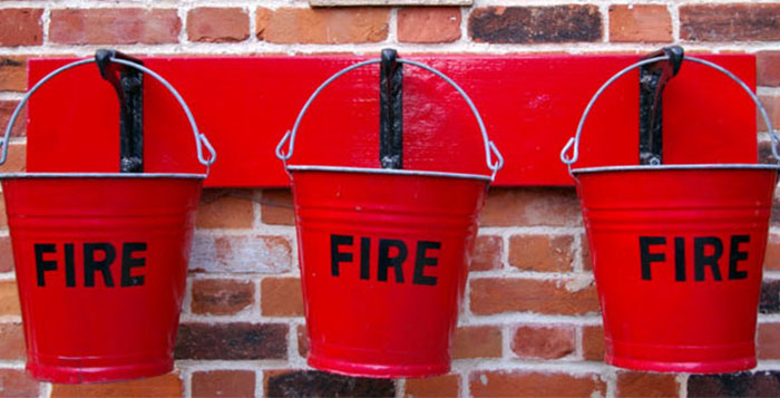 Fire buckets on wall